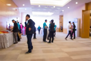 Abstract people walking in exhibition blurred background.jpg