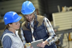 Engineers-in-steel-factory-working-on-digital-tablet