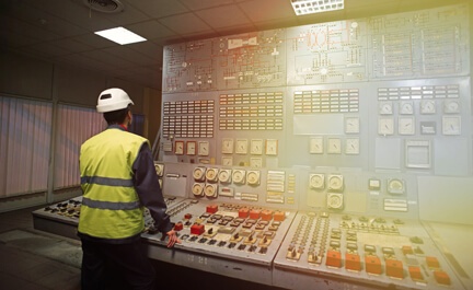 An energy management employee tracks utility usage and consumption.