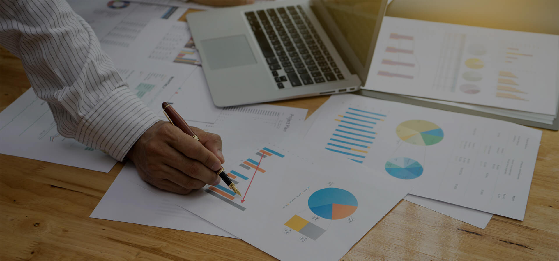 Environmental, compliance and sustainability reports being used by an EHS manager.