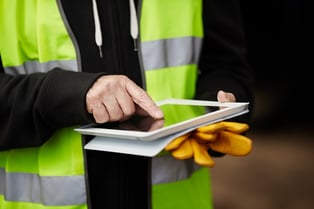 construction worker using digital tablet