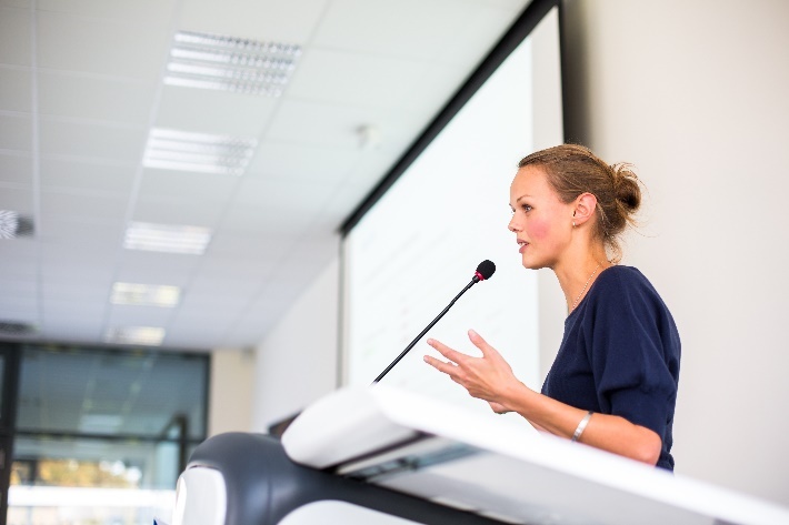 speaker-conference-female-gesturing.jpg